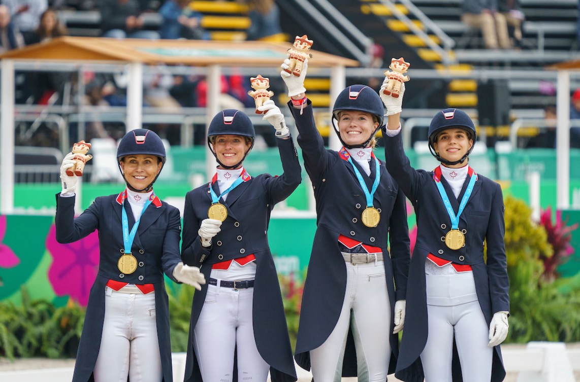 Jill Irving, Lindsay Kellock, Tina Irwin, and Naïma Moreira-Laliberté of Canada win gold in team dressage at the Lima 2019 Pan American Games in Lima, Peru