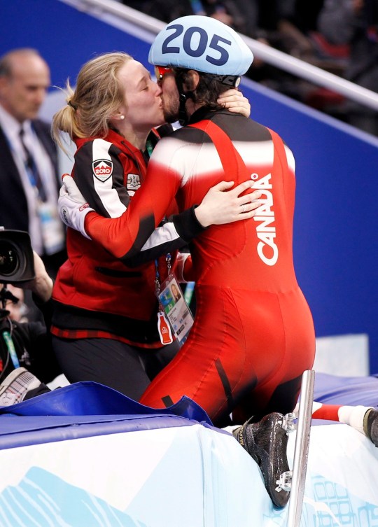 Charles Hamelin kisses his girlfriend