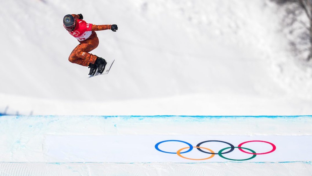 Team Canada snowboarder Eliot Grondin competes in the men’s snowboard cross event during Beijing 2022