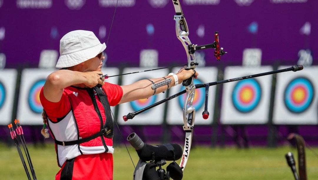 Stephanie Barrett prepares to shoot an arrow from her bow