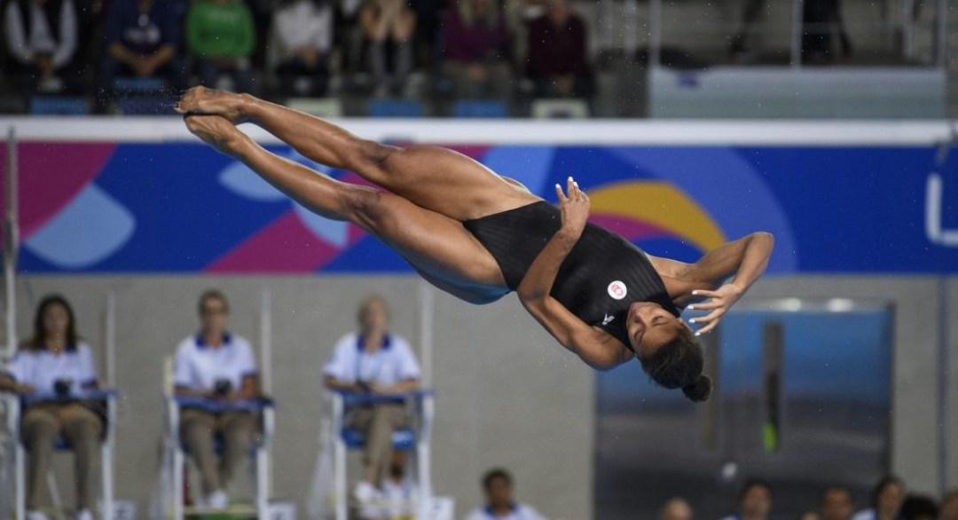 Jennifer Abel twirling during a dive