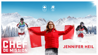Jennifer Heil holding the Canada flag